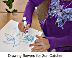 Student drawing a flower.